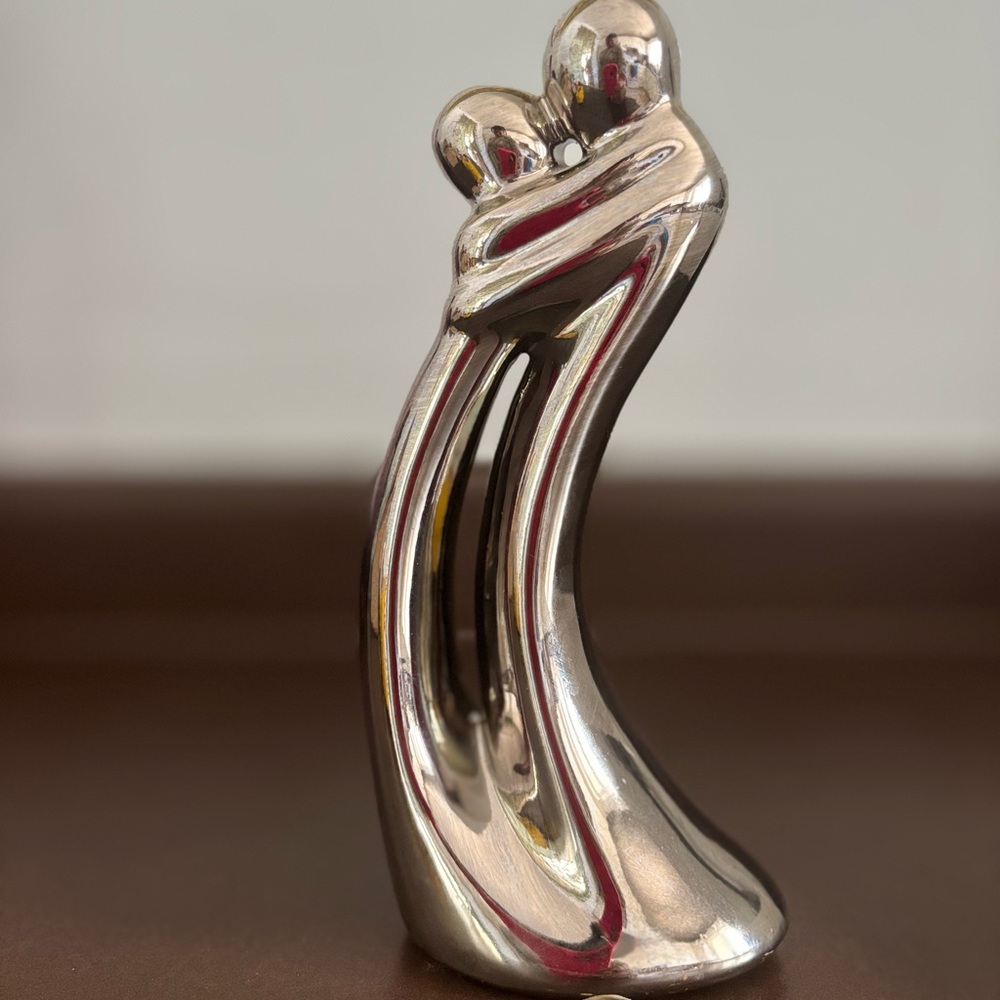 Elegant Silver Embrace Sculpture - Picture 1 of 6